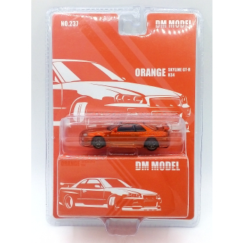 Nissan Skyline GT-R R34 orange - skala 1:64 - DM Model